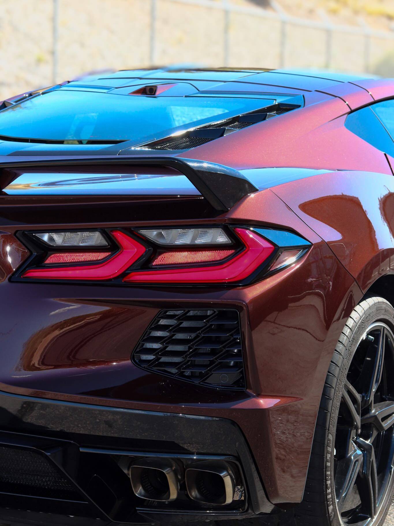 Burgundy Chevrolet Corvette C8 rear detail after a ceramic coating in Lorain County, Ohio