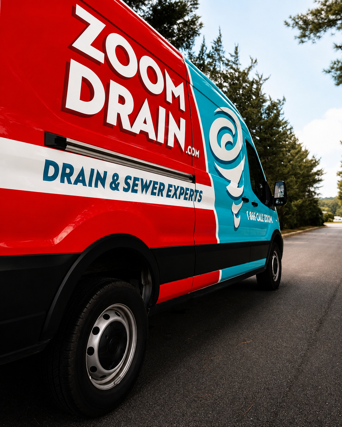 Bright red and blue Zoom Drain commercial van wrap with bold fleet graphics by CustomsByAli