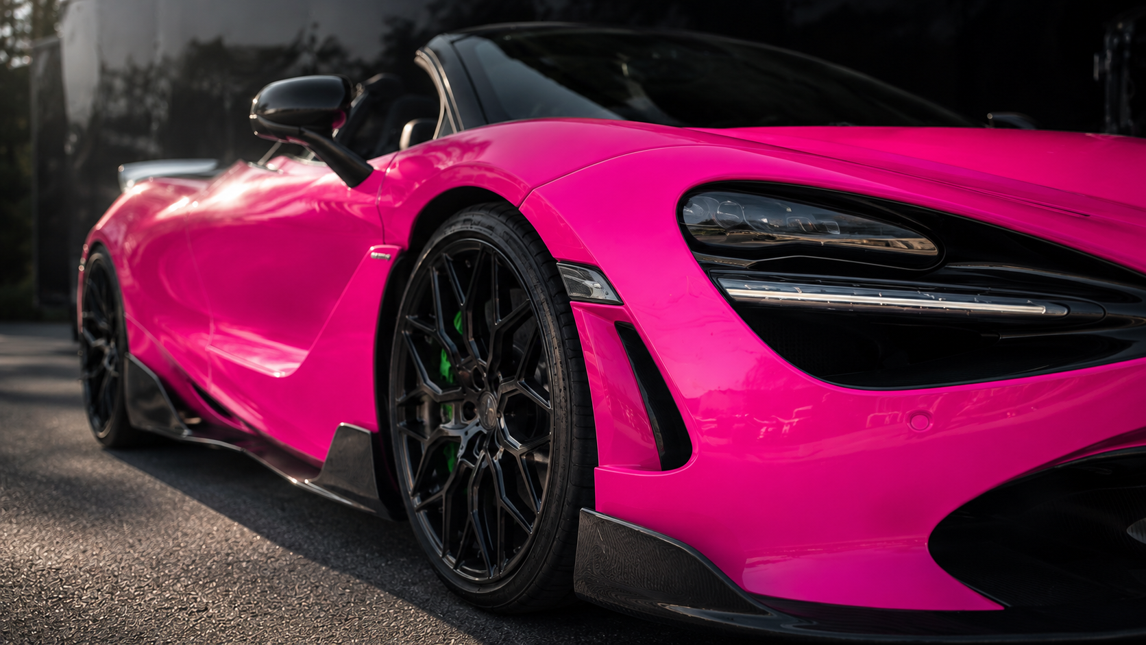 Hot pink gloss wrapped McLaren 720S finished by CustomsByAli for a Lorain, Ohio customer