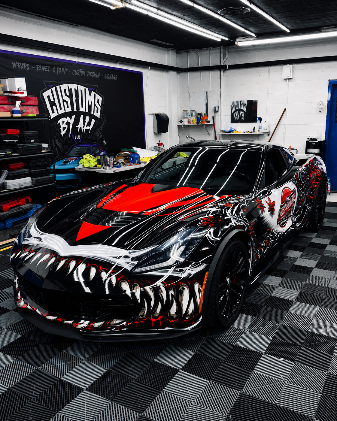 CustomsByAli Corvette with full printed vinyl wrap and graphics in the Elyria, OH shop