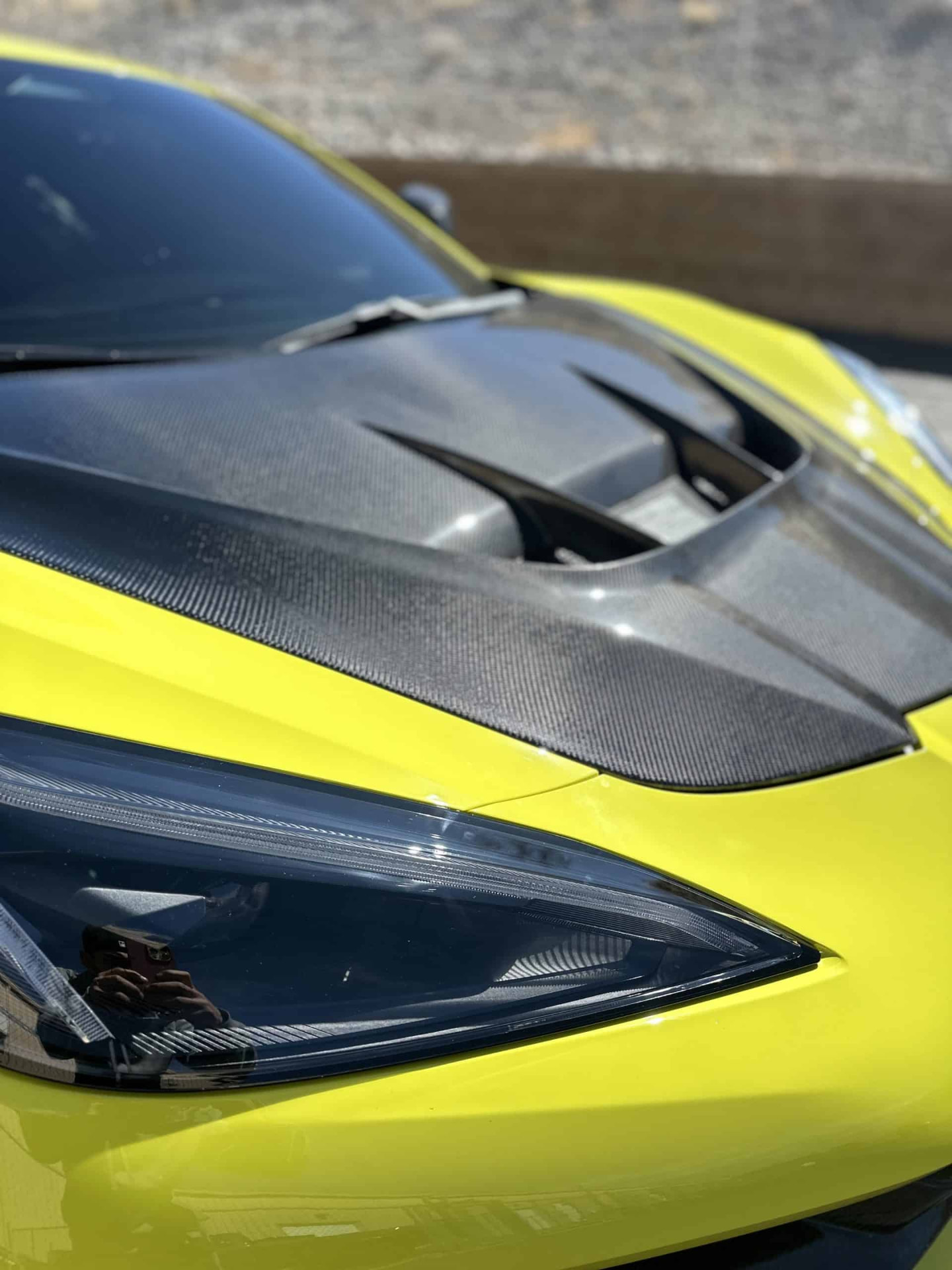 Yellow Chevrolet Corvette with carbon fiber accents after a ceramic coating detail in North Ridgeville, Ohio